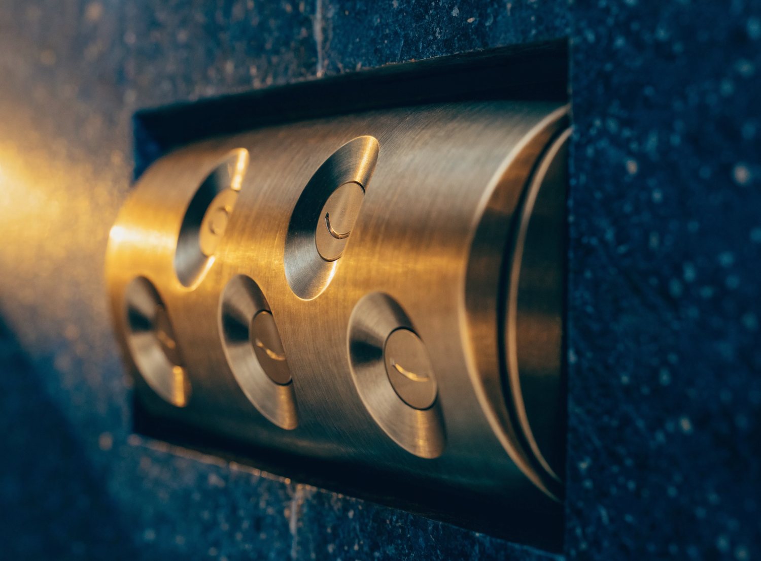 Brushed-brass lighting keypad detail