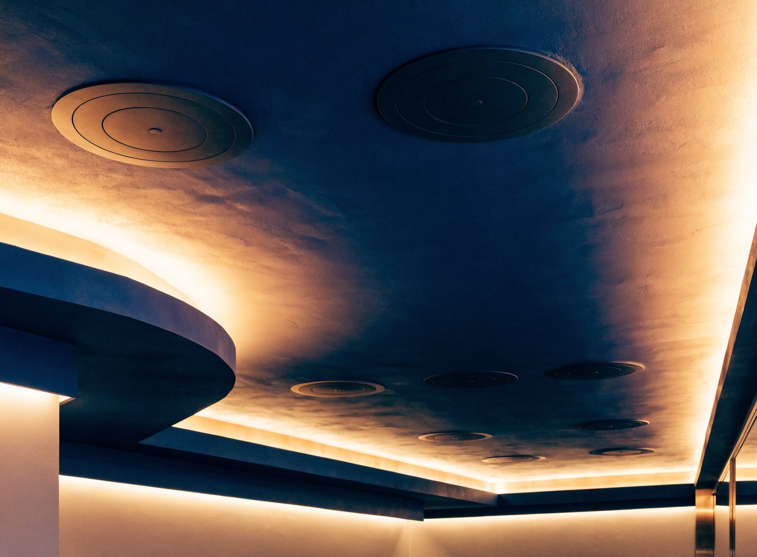 Concealed in-ceiling speakers and lighting
