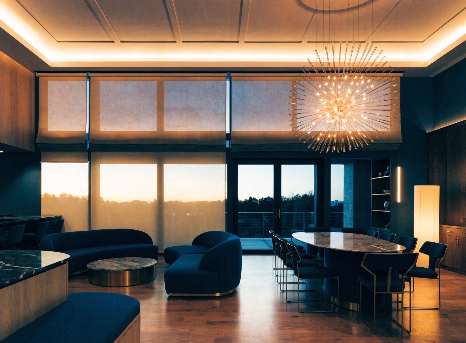 Open-plan luxury living space at dusk